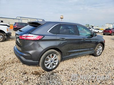 Trzecie zdjęcie samochodu z tyłu: 2019 FORD EDGE TITANIUM VIN:2FMPK4K94KBC64489 - miniatura