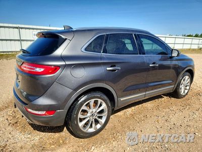 Trzecie zdjęcie samochodu z tyłu: 2018 LINCOLN MKC SELECT VIN:5LMCJ2D99JUL31273 - miniatura