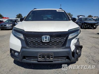 Piąte zdjęcie samochodu w środku: 2019 HONDA PASSPORT TOURING VIN:5FNYF7H98KB002757 - miniatura