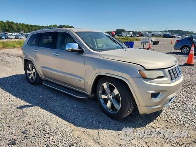 Czwarte zdjęcie samochodu z boku: 2014 JEEP GRAND CHEROKEE OVERLAND VIN:1C4RJFCG9EC168970 - miniatura