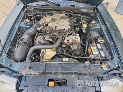 Zdjęcie 11 z 12 samochodu: 1999 FORD MUSTANG VIN:1FAFP4042XF130438 - miniatura