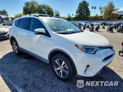 Czwarte zdjęcie samochodu z boku: 2016 TOYOTA RAV4 XLE VIN:JTMWFREV4GJ083020 - miniatura
