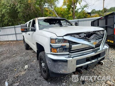 Czwarte zdjęcie samochodu z boku: 2016 CHEVROLET SILVERADO K2500 HEAVY DUTY VIN:1GC1KUE80GF164232 - miniatura