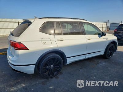 Trzecie zdjęcie samochodu z tyłu: 2021 VOLKSWAGEN TIGUAN SE VIN:3VV3B7AXXMM031868 - miniatura