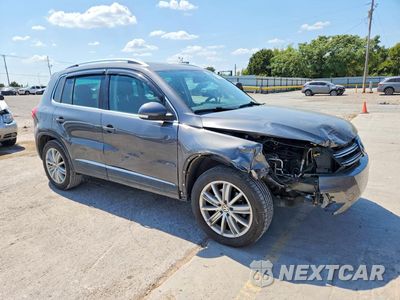 Czwarte zdjęcie samochodu z boku: 2015 VOLKSWAGEN TIGUAN S VIN:WVGBV7AX4FW580255 - miniatura