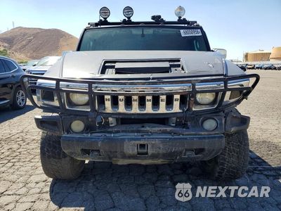 Piąte zdjęcie samochodu w środku: 2003 HUMMER H2 VIN:5GRGN23U63H132744 - miniatura