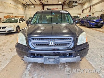 Piąte zdjęcie samochodu w środku: 2005 HONDA PILOT EXL VIN:5FNYF185X5B052574 - miniatura