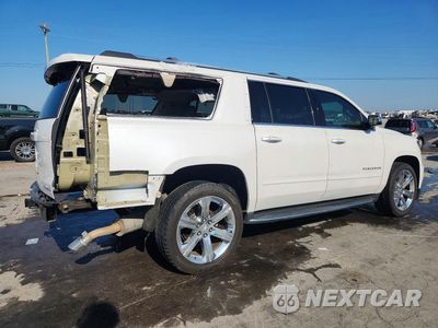 Trzecie zdjęcie samochodu z tyłu: 2019 CHEVROLET SUBURBAN K1500 PREMIER VIN:1GNSKJKC0KR211768 - miniatura