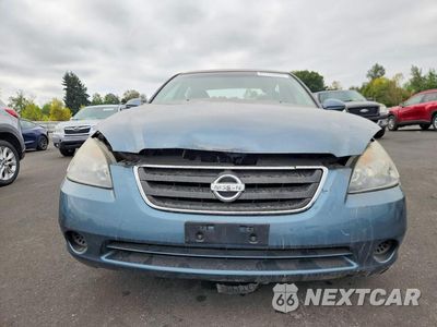 Piąte zdjęcie samochodu w środku: 2002 NISSAN ALTIMA 2.5 VIN:1N4AL11D02C254947 - miniatura