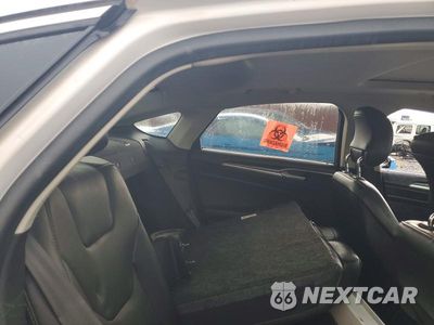 Zdjęcie 10 z 12 samochodu: 2014 FORD FUSION TITANIUM HEV VIN:3FA6P0RU5ER190225 - miniatura