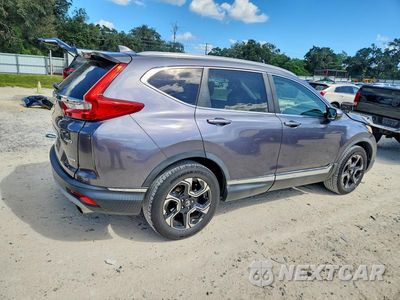 Trzecie zdjęcie samochodu z tyłu: 2017 HONDA CR-V TOURING VIN:5J6RW2H99HL000491 - miniatura