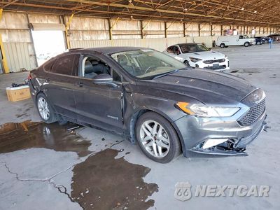 Czwarte zdjęcie samochodu z boku: 2017 FORD FUSION SE HYBRID VIN:3FA6P0LU6HR224069 - miniatura