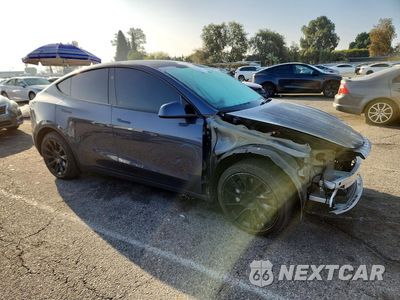 Czwarte zdjęcie samochodu z boku: 2023 TESLA MODEL Y VIN:7SAYGDEE6PF871283 - miniatura