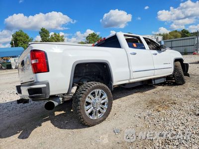 Trzecie zdjęcie samochodu z tyłu: 2015 GMC SIERRA K2500 DENALI VIN:1GT120E82FF102838 - miniatura