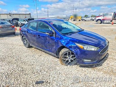 Czwarte zdjęcie samochodu z boku: 2017 FORD FOCUS SEL VIN:1FADP3H25HL229150 - miniatura