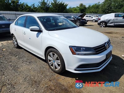 Czwarte zdjęcie samochodu z boku: 2017 VOLKSWAGEN JETTA S VIN:3VW2B7AJ1HM314166 - miniatura