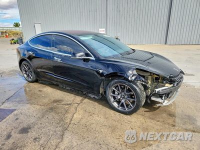 Czwarte zdjęcie samochodu z boku: 2018 TESLA MODEL 3 VIN:5YJ3E1EB1JF178713 - miniatura