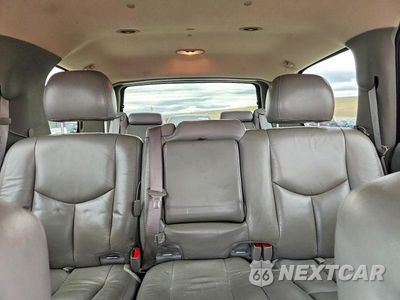 Zdjęcie 10 z 13 samochodu: 2003 GMC YUKON VIN:1GKEK13Z13J197053 - miniatura