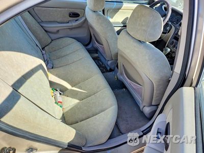Zdjęcie 10 z 12 samochodu: 2003 HYUNDAI ELANTRA GLS VIN:KMHDN45D03U601097 - miniatura