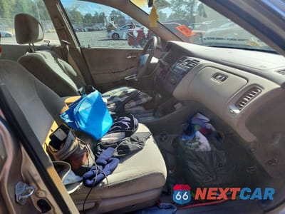 Zdjęcie 7 z 12 samochodu: 2001 HONDA ACCORD LX VIN:1HGCG56471A138390 - miniatura