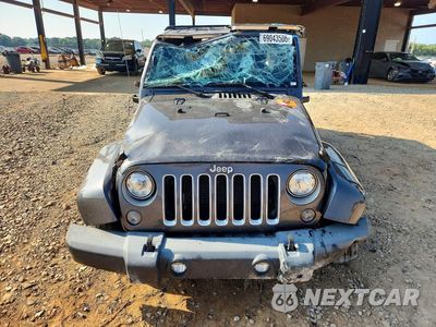 Piąte zdjęcie samochodu w środku: 2017 JEEP WRANGLER UNLIMITED SAHARA VIN:1C4BJWEG3HL511422 - miniatura