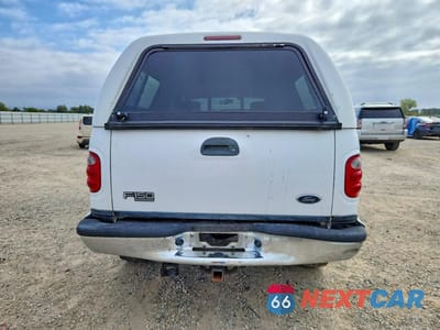 Zdjęcie 6 z 12 samochodu: 2002 FORD F150 SUPERCREW VIN:1FTRW08L72KB57827 - miniatura