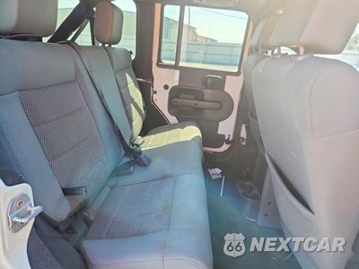 Zdjęcie 10 z 12 samochodu: 2009 JEEP WRANGLER UNLIMITED RUBICON VIN:1J4GA69119L745193 - miniatura
