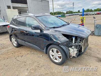 Czwarte zdjęcie samochodu z boku: 2011 HYUNDAI TUCSON GLS VIN:KM8JU3AC9BU201616 - miniatura