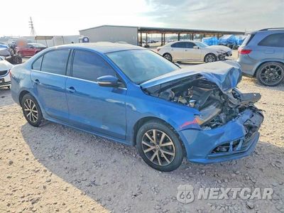 Czwarte zdjęcie samochodu z boku: 2017 VOLKSWAGEN JETTA SE VIN:3VWDB7AJ4HM203832 - miniatura