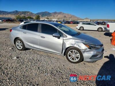 Czwarte zdjęcie samochodu z boku: 2016 CHEVROLET CRUZE LT VIN:1G1BE5SMXG7294248 - miniatura