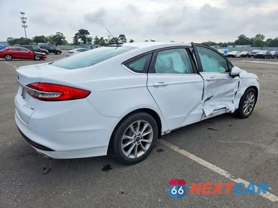 Trzecie zdjęcie samochodu z tyłu: 2017 FORD FUSION SE VIN:3FA6P0H75HR183761 - miniatura