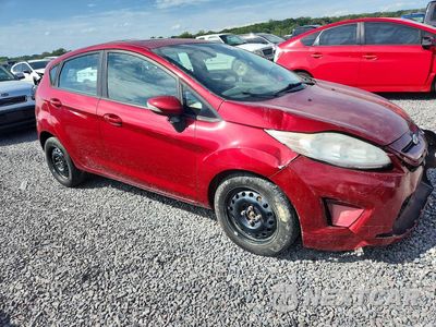 Czwarte zdjęcie samochodu z boku: 2013 FORD FIESTA SE VIN:3FADP4EJ3DM225723 - miniatura