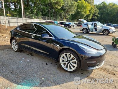 Czwarte zdjęcie samochodu z boku: 2019 TESLA MODEL 3 VIN:5YJ3E1EAXKF466528 - miniatura
