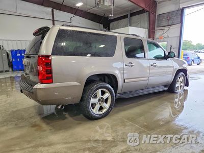 Trzecie zdjęcie samochodu z tyłu: 2013 CHEVROLET SUBURBAN K1500 LS VIN:1GNSKHE73DR107463 - miniatura