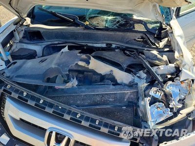 Zdjęcie 12 z 14 samochodu: 2011 HONDA PILOT EXL VIN:5FNYF3H5XBB029173 - miniatura