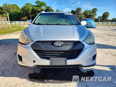 Piąte zdjęcie samochodu w środku: 2011 HYUNDAI TUCSON GLS VIN:KM8JU3AC0BU263180 - miniatura