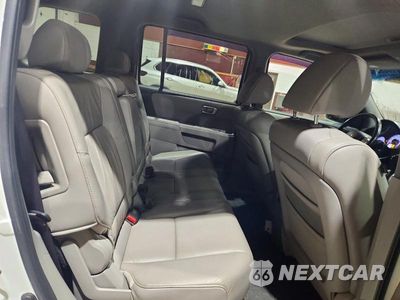 Zdjęcie 11 z 14 samochodu: 2011 HONDA PILOT EXL VIN:5FNYF4H52BB001373 - miniatura