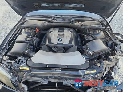 Zdjęcie 11 z 12 samochodu: 2007 BMW 750 I VIN:WBAHL83587DT11031 - miniatura