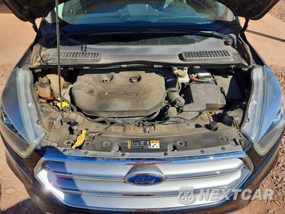Zdjęcie 12 z 13 samochodu: 2017 FORD ESCAPE TITANIUM VIN:1FMCU0J96HUC02162 - miniatura