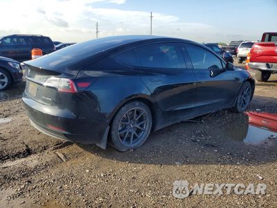 Trzecie zdjęcie samochodu z tyłu: 2022 TESLA MODEL 3 VIN:5YJ3E1EB1NF249446 - miniatura