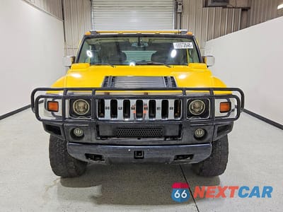 Piąte zdjęcie samochodu w środku: 2003 HUMMER H2 VIN:5GRGN23U13H146938 - miniatura