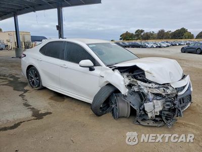 Czwarte zdjęcie samochodu z boku: 2019 TOYOTA CAMRY HYBRID SE VIN:4T1B21HK0KU517045 - miniatura
