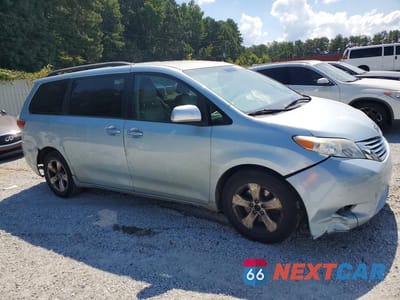 Czwarte zdjęcie samochodu z boku: 2015 TOYOTA SIENNA LE VIN:5TDKK3DC9FS631196 - miniatura