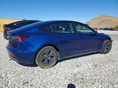 Trzecie zdjęcie samochodu z tyłu: 2023 TESLA MODEL 3 VIN:5YJ3E1EA2PF541536 - miniatura