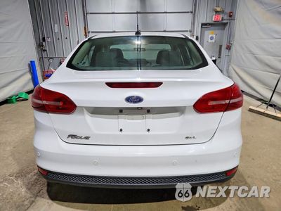 Zdjęcie 6 z 12 samochodu: 2017 FORD FOCUS SEL VIN:1FADP3H23HL213917 - miniatura