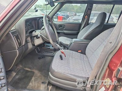 Zdjęcie 7 z 14 samochodu: 2000 JEEP CHEROKEE SPORT VIN:1J4FT48S5YL268741 - miniatura
