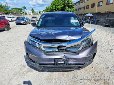 Piąte zdjęcie samochodu w środku: 2020 HONDA PILOT LX VIN:5FNYF5H19LB025867 - miniatura