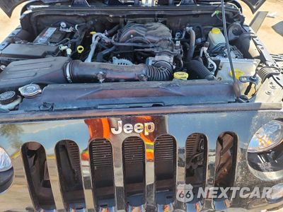 Zdjęcie 12 z 13 samochodu: 2013 JEEP WRANGLER UNLIMITED SAHARA VIN:1C4HJWEG6DL579721 - miniatura
