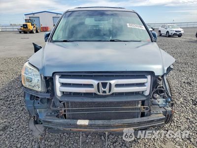 Piąte zdjęcie samochodu w środku: 2006 HONDA PILOT EX VIN:2HKYF18636H500164 - miniatura