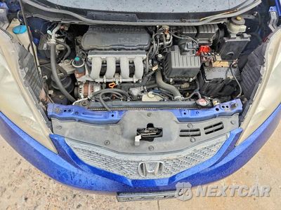 Zdjęcie 11 z 12 samochodu: 2010 HONDA FIT SPORT VIN:JHMGE8H46AC004767 - miniatura